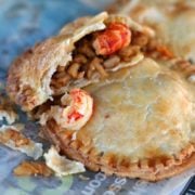 crawfish pies on top of each other, one of them is cat in half
