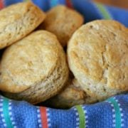 a basket of honey wheat biscuits