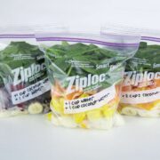 three zip bags with ingredients to make smoothies