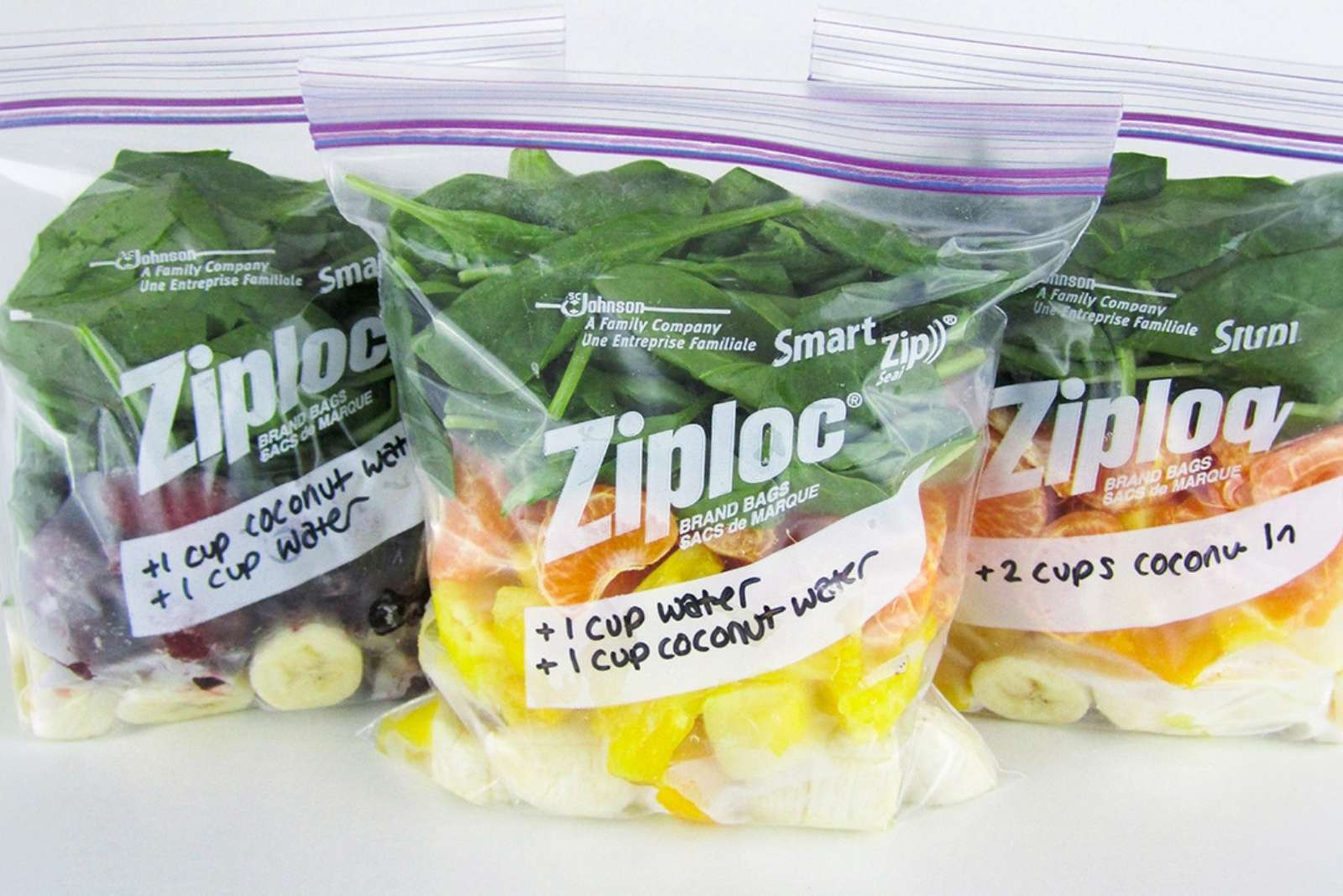 three zip bags with ingredients to make smoothies