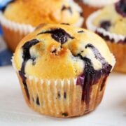 soft and golden blueberry muffin made with frozen blueberries