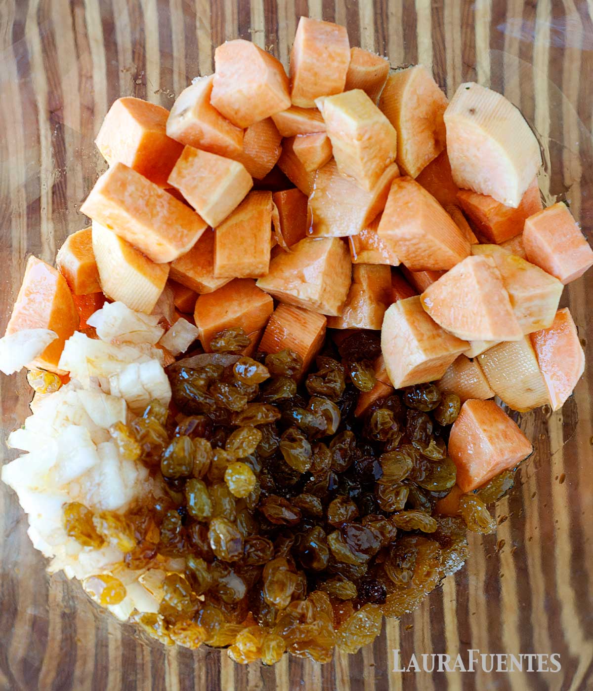 ingredients of Paleo Sweet Potato Casserole in a glass bowl