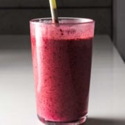 a glass of berry juice