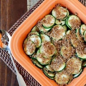 overhead view of zucchini au gratin in a baking dish
