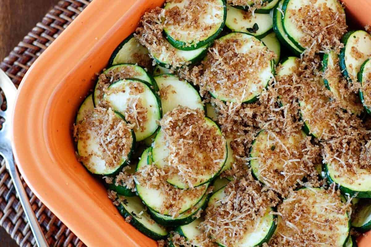 overhead view of zucchini au gratin in a baking dish