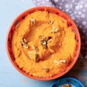 overhead view of a bowl of sweet potato hummus