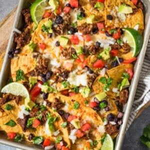 overhead view of a simple nacho tray on a sheet pan
