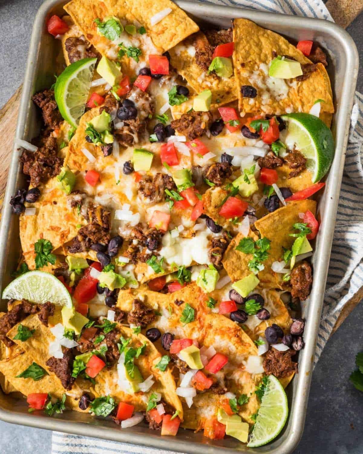 homemade nachos on a sheet pan