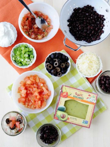 the ingredients of 7 layer mexican dip cup