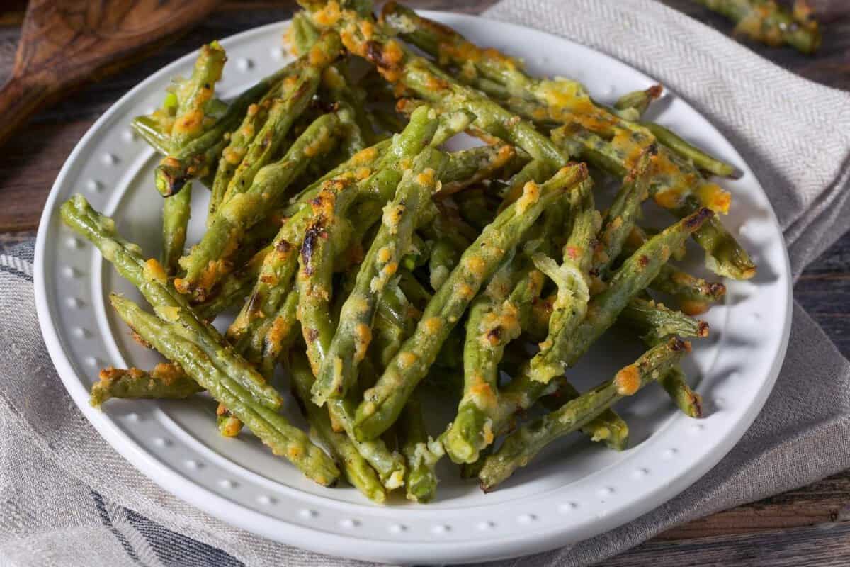 roasted Parmesan green beans in a white dish