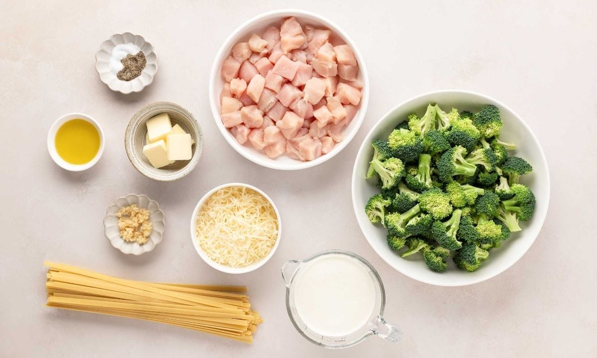 overhead view of ingredients needed to make chicken broccoli alfredo