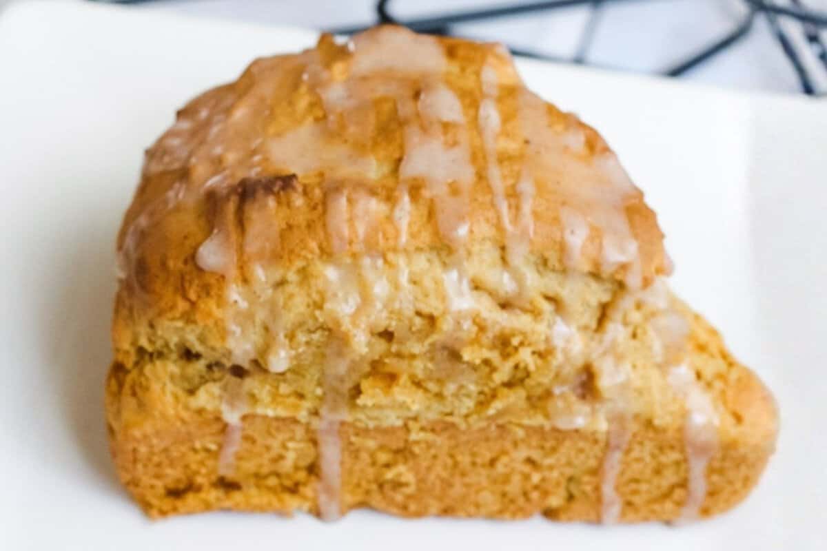 close up of a pumpkin scone with galze