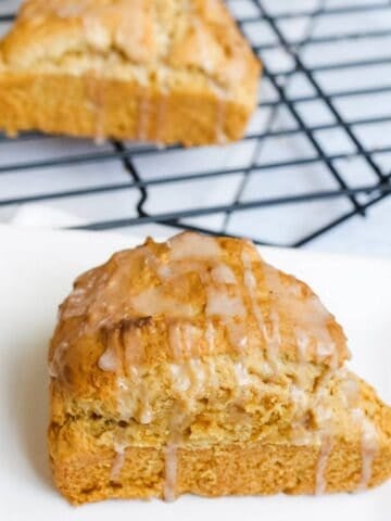 two pumpkin scones with glaze