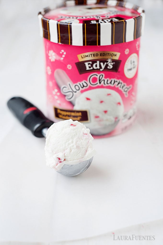 large scoop of peppermint ice cream with a carton in the background