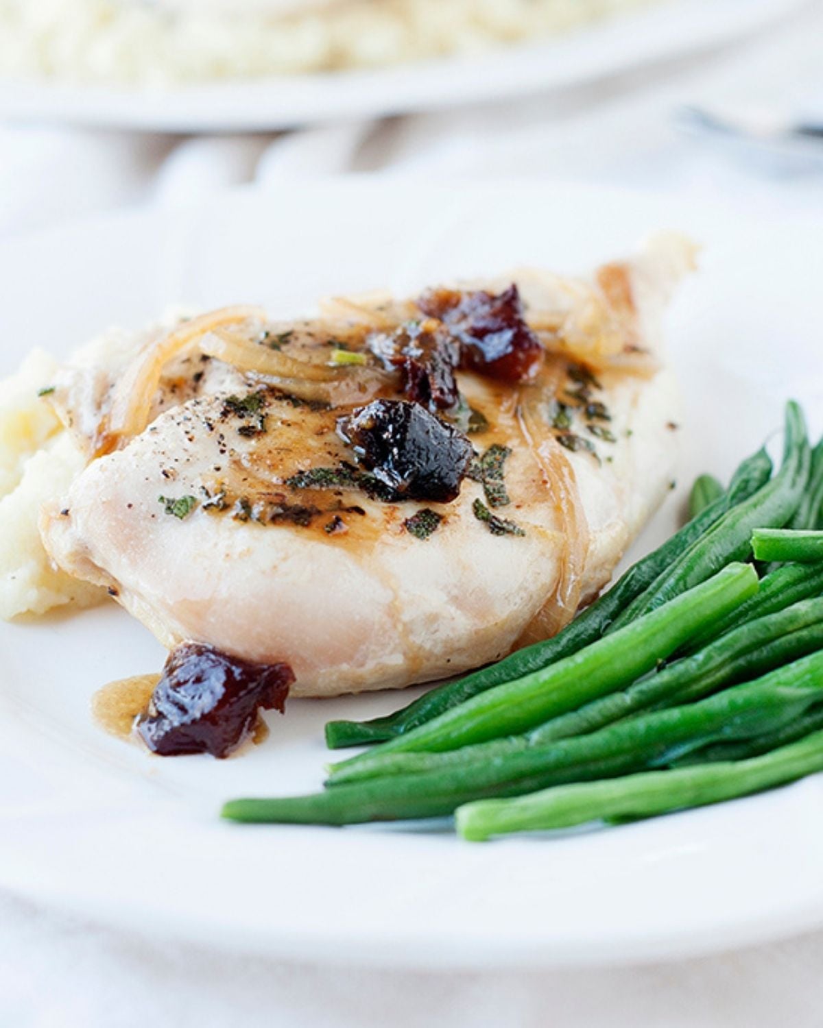 pan seared chicken breast with prunes and onions