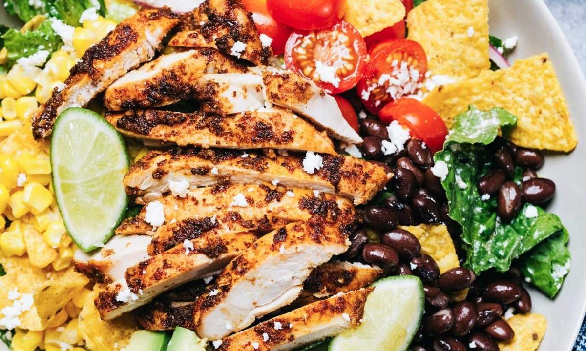 santa fe chicken salad with tomatoes, avocado, corn, and black beans