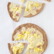 Need a fun breakfast idea? These Ham, Egg, & Cheese Breakfast Pizzas are delicious and can be made gluten free!