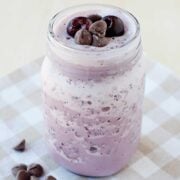 purple cherry smoothie topped with chocolate chips