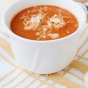 a cup of tomato tortellini soup