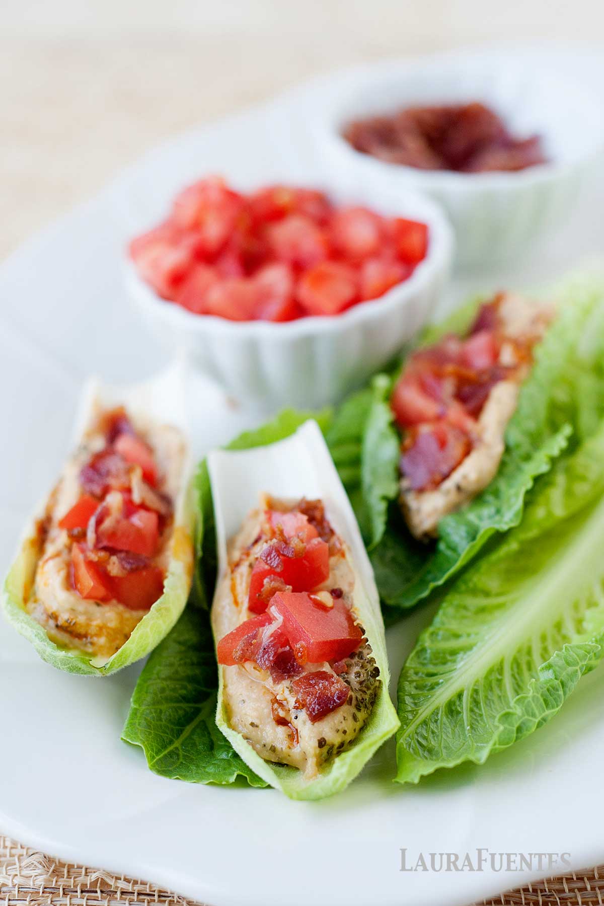 BLT hummus cups on a plate
