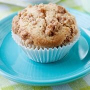 pear crumble muffins on a blue plate