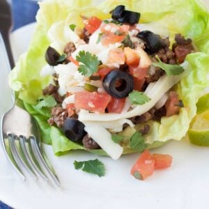 close-up of a taco lettuce cup on a white plate