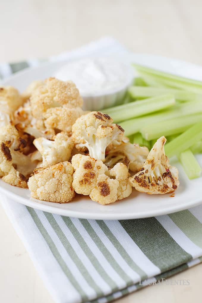 Healthy Buffalo Cauliflower Bites: Perfect for an appetizer, snack or side dish when you want to add a little heat and keep it healthy. Paleo, gluten-free and grain-free.