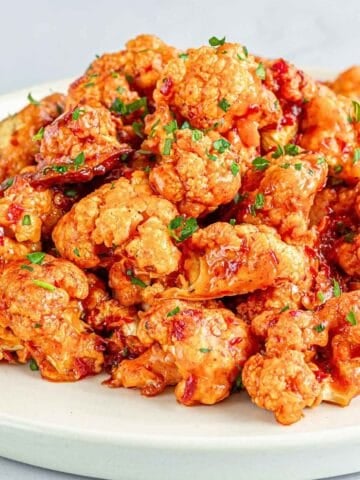 a dish with buffalo cauliflower bites