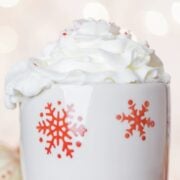 a festive mug topped with whipped cream