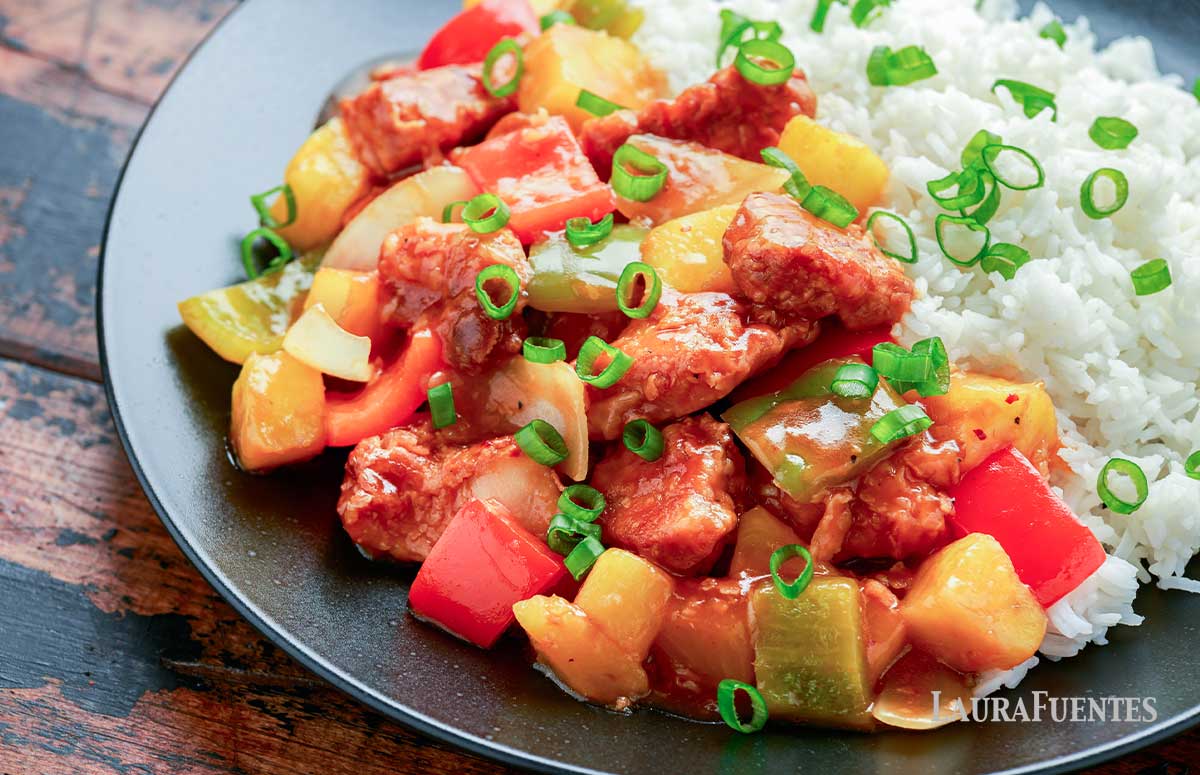 pineapple pork stir fry and rice on the side