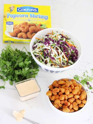 Healthy ingredients for an easy Bang Bang Shrimp Salad with baked shrimp