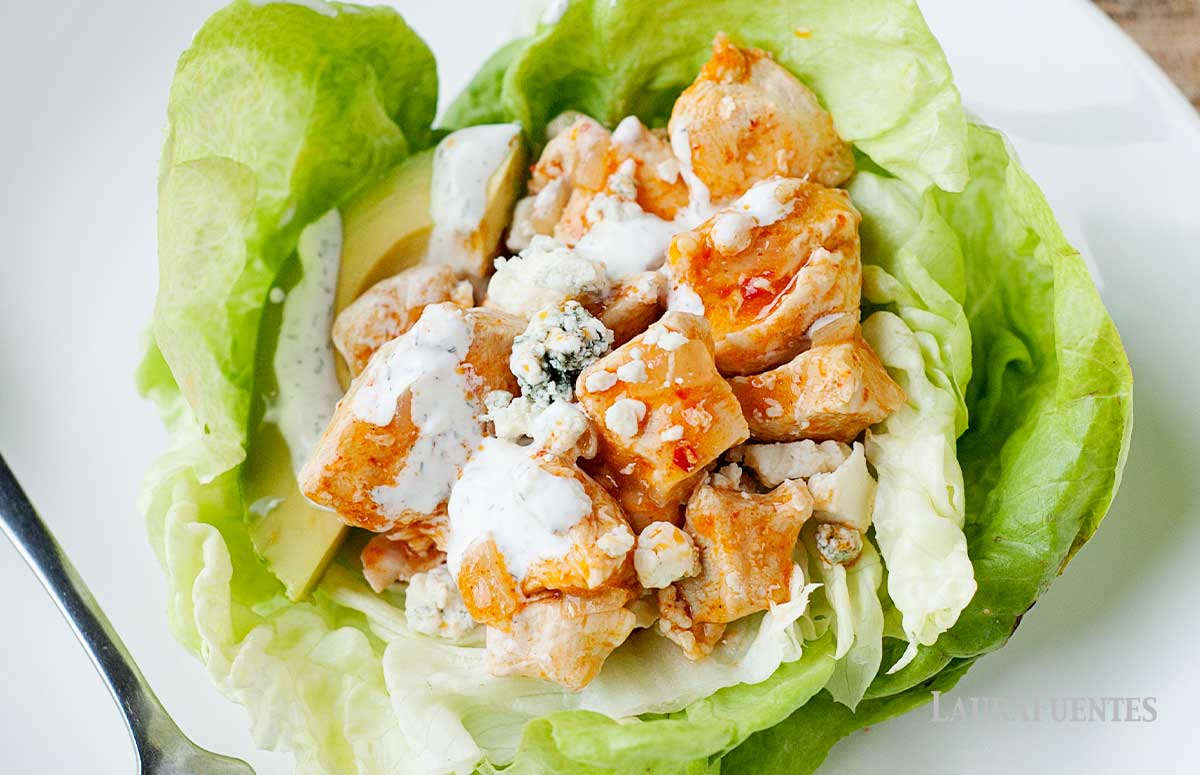 buffalo chicken lettuce wraps on a white plate