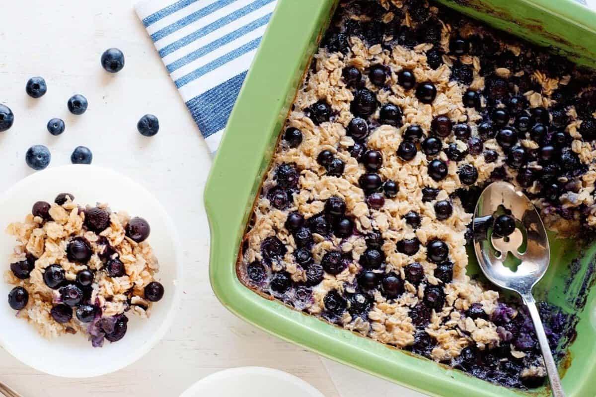 overhead view of baked blueberry oatmeal in a baking dish
