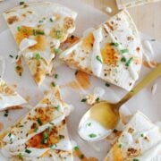 Sliced quesadillas with Ranch and Buffalo sauce