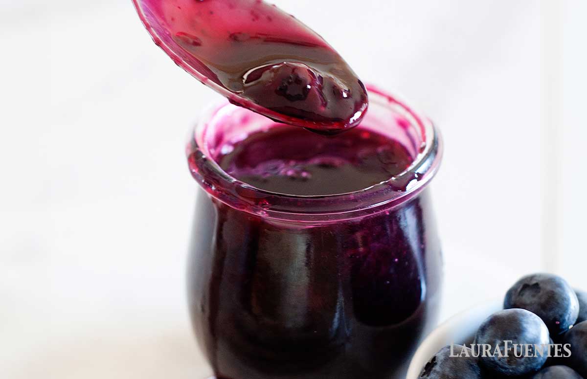homemade blueberry syrup in a glass bowl