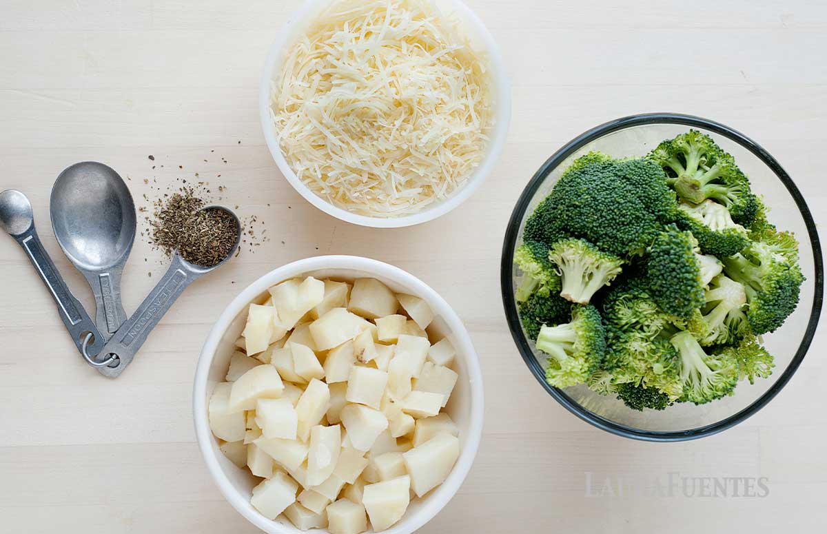 small bowls of ingredients for broccoli tots, including broccoli cheese and spices
