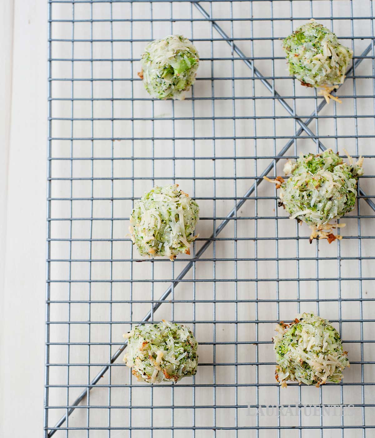 baked broccoli tots on a cooling rack