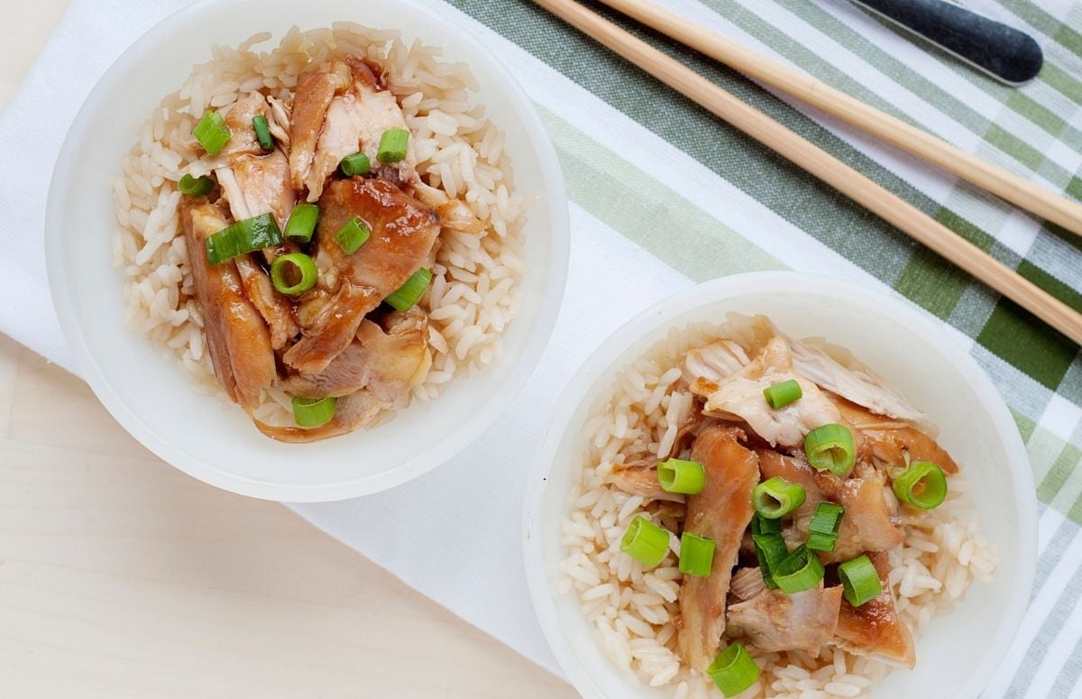 top view of two bowls of teriyaki chicken with rice