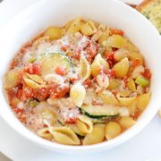 top view of a white bowl with minestrone soup