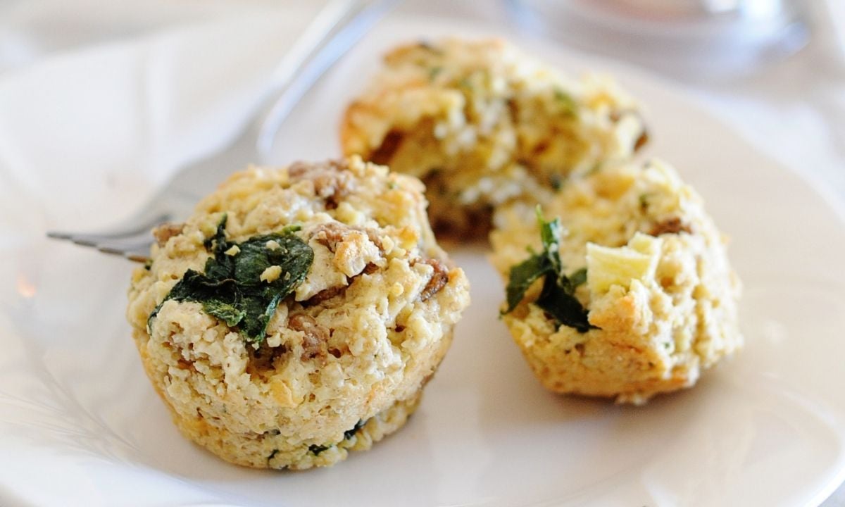 two savory sausage muffins with spinach