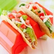 salsa chicken tacos in truck shaped taco holders