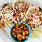 overhead view of hawaiian pork tacos on a plate