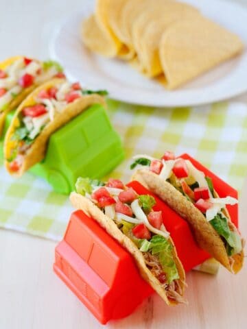 salsa chicken tacos in truck shaped taco holders