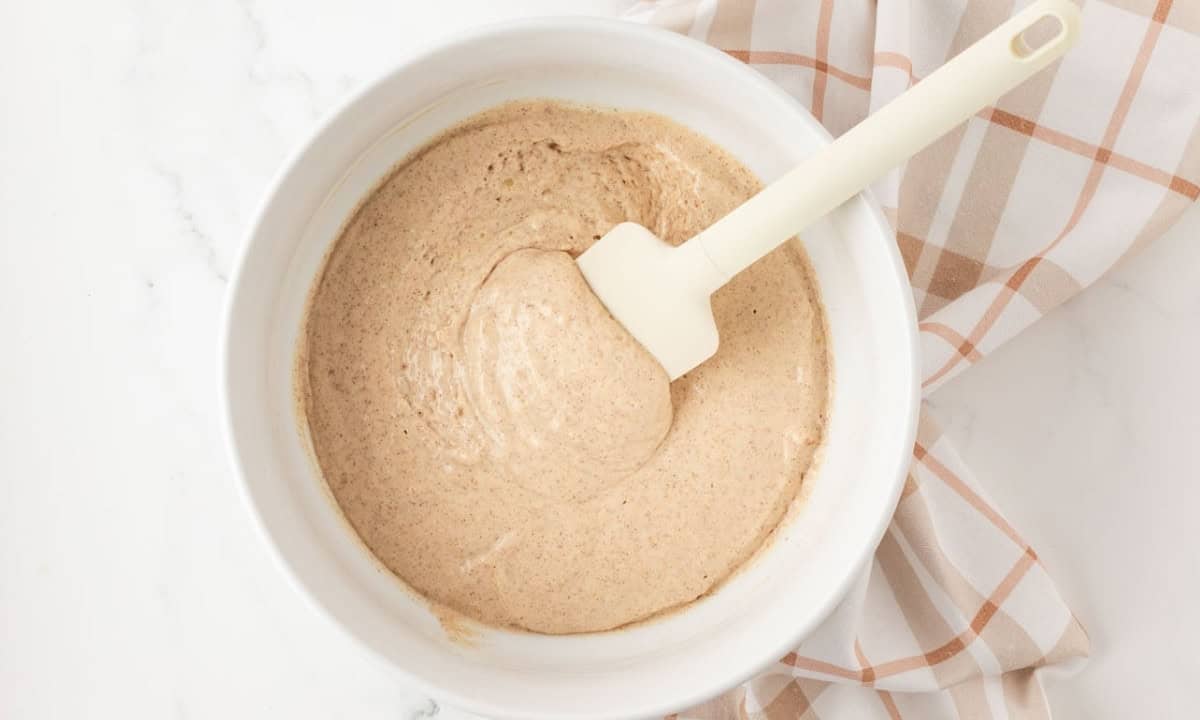 overhead view of mixed cinnamon pancake batter
