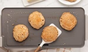 cinnamon pancakes ready to be taken off the griddle