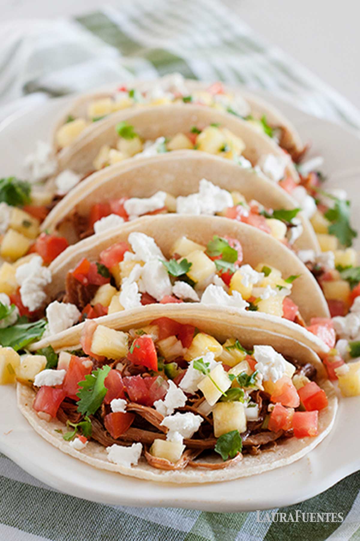 pulled pork tacos on a plate