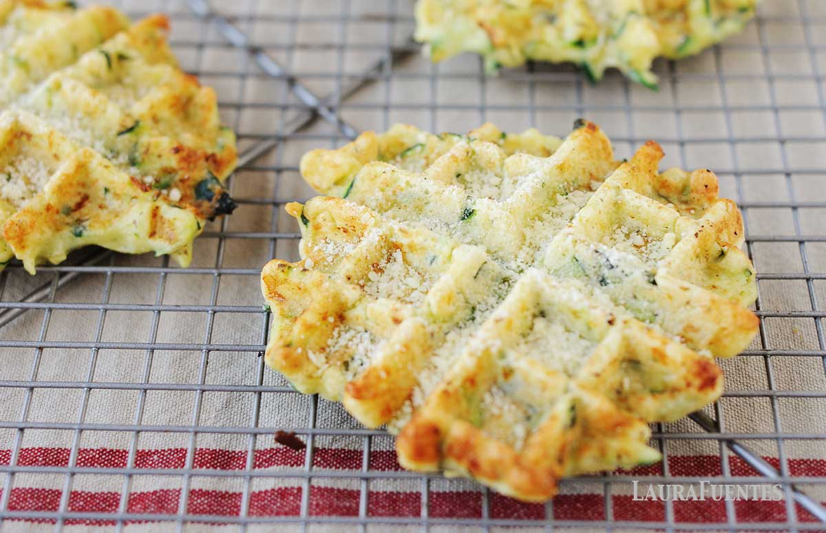 zucchini pasmesan waffles after baking on a grid