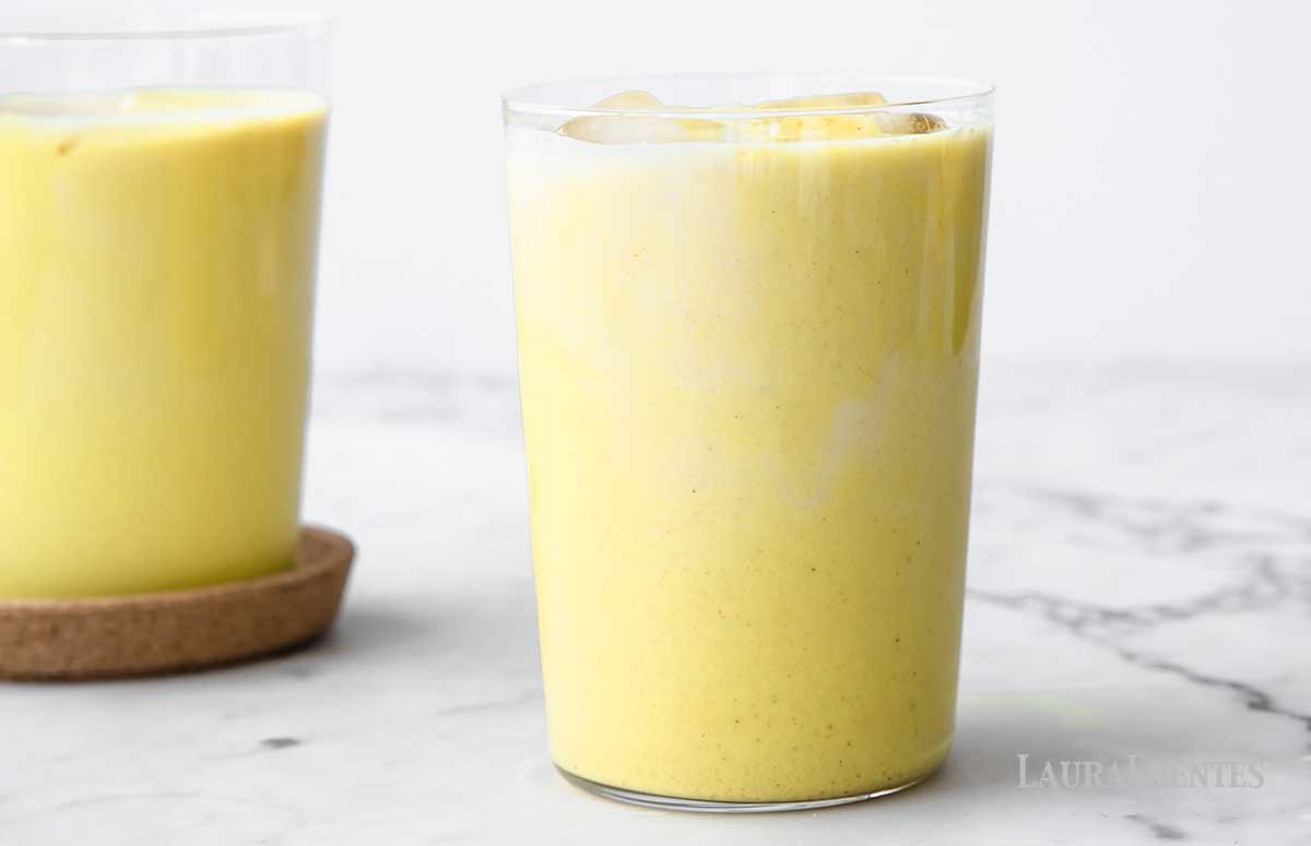 two glasses of golden milk latte