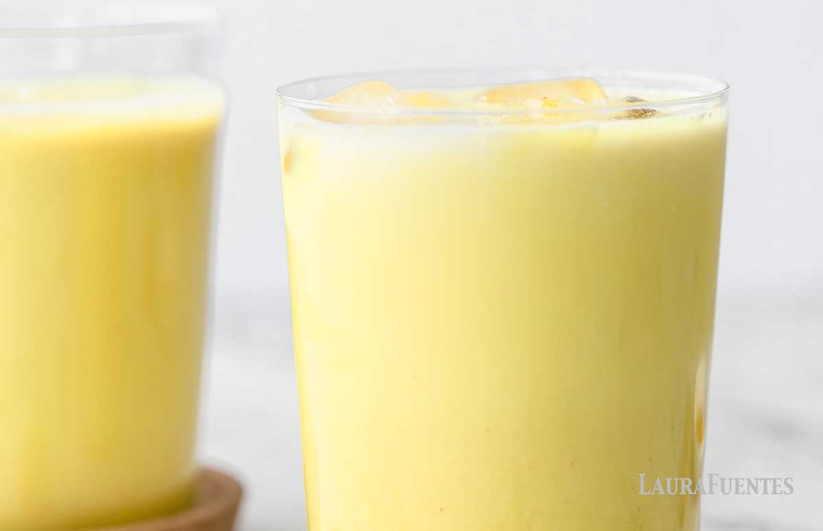 two glasses of golden milk latte