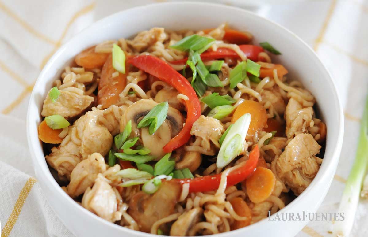 a bowl of ramen, vegetables and chicken